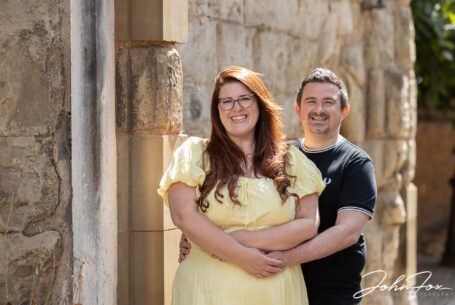 Pre-wedding shoot image of the couple on an old Leicester street by John Fox