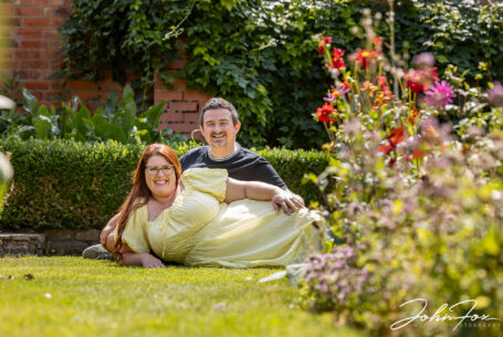 Pre-wedding shoot in Leicestershire with couple photographed in a garden