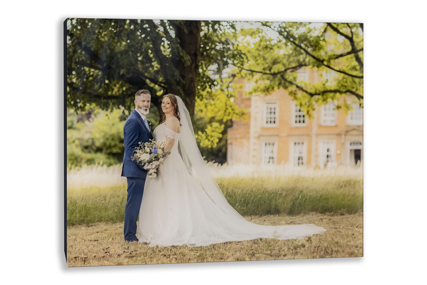 Natalie and Simon on the front cover of their Ansty Hall bespoke Wedding Album.