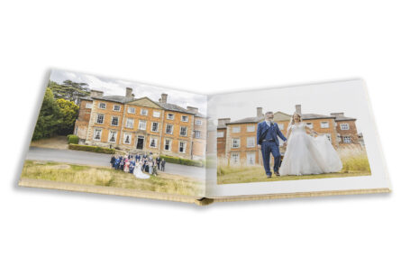 Natalie and Simon's Wedding Album showing images of them outside Ansty Hall with the venue in the background.