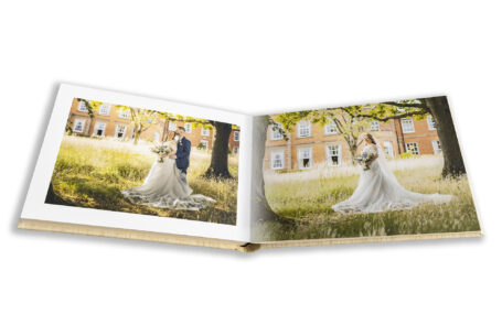 Natalie and Simon's Wedding Album showing images of them in the grounds at Ansty Hall. Image by John Fox Wedding Photography.
