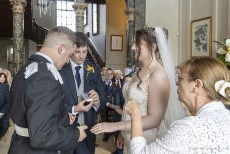 Wedding ceremony best man with the wedding rings for Grace and Elliot at Chicheley Hall in Buckinghamshire