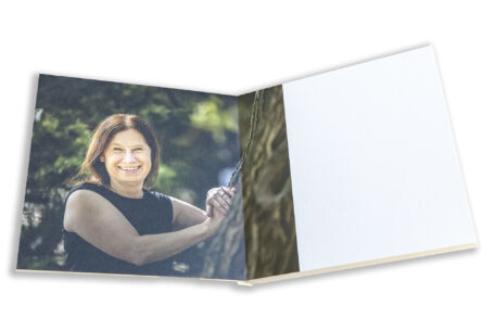Image of Rebecca the bride-to-be leaning on a tree at Hadley Park House in Telford, Shropshire