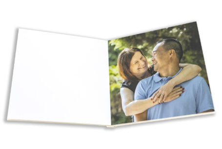 Image of Rebecca and Son the couple-to-be laughing in the grounds at Hadley Park House in Telford, Shropshire