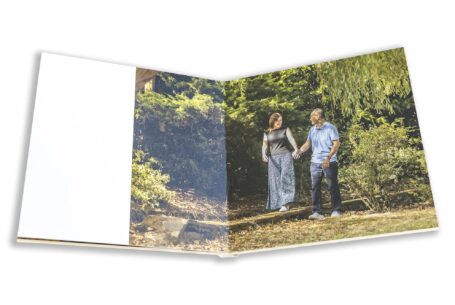 The couple-to-be walking in the grounds at Hadley Park House in Telford Shropshire. Photo by John Fox Wedding Photography