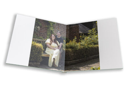 Bespoke wedding guest book containing images of the couple on their pre-wedding shoot in Leicester