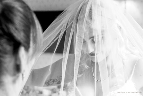Bride and her veil at Kilworth House. Image by John Fox Wedding Photography.