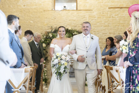 Gabrielle with her father walking down the aisle. Image by John Fox Wedding Photography.