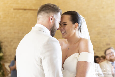 Bride and groom, Gabrielle and William, just married at Kingscote Barn, Tetbury