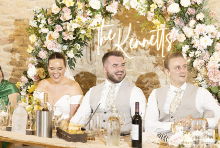 Wedding speeches, bride and groom with best man and their reactions captured by John Fox Wedding Photography