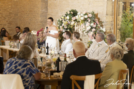 Wedding speech by Gabrielle the bride at Cotswold wedding venue Kingscote Barn, Tetbury