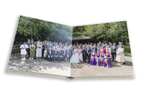 Branston Golf and Country Club Wedding. Bespoke wedding album image of the couple and all their guests