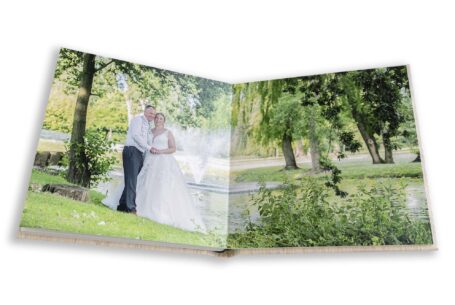 Samantha and Paul’s wedding album showing an image of them in the grounds of Branston Golf Club