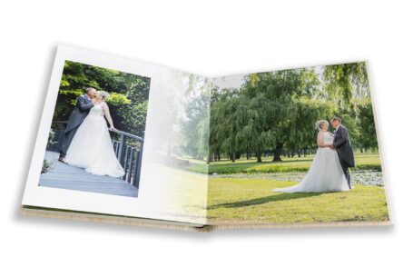 Wedding album showing the bride and groom in the grounds of Branston Golf Club, Staffordshire by John Fox Wedding Photography