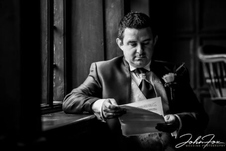 Groom checking his speech for his Leicester Wedding