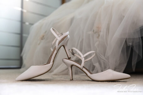 Sarah, the bride's, shoes. Bridal preparations Wedding at Keele Hall in Staffordshire.