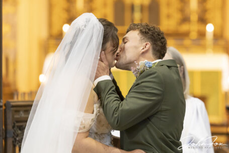 You may kiss the bride image taken at Ashley St John the Baptist Church in Staffordshire by John Fox