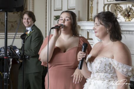 Sarah and her sister performing a song at the wedding celebrations in Staffordshire.