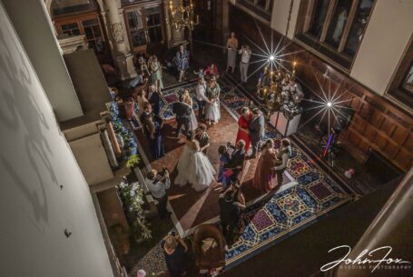 Image taken from above the dance floor at Sarah and Lewis's wedding celebrations at Keele Hall in Staffordshire