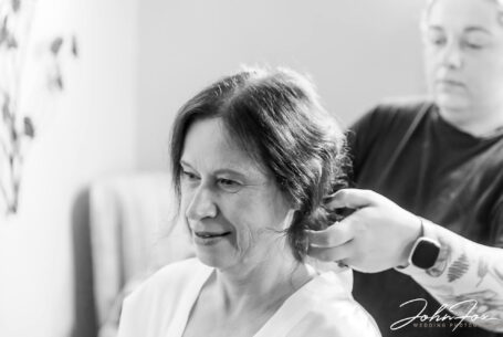 Bridal preparations. Rebecca with her hair stylist at Hadley Park House, Telford. Photo by John Fox Wedding Photography
