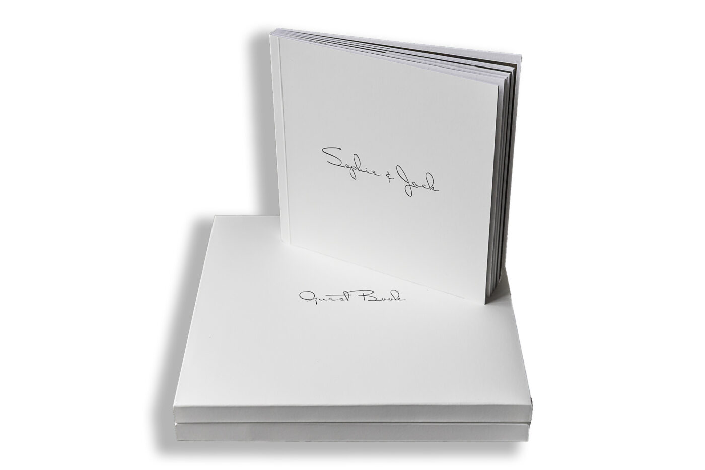 Sophie and Jack's elegant wedding guest book filled with pre-wedding images at Hothorpe Hall The Woodlands.