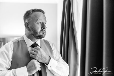 Matthew the Groom preparing for his wedding in Milton Keynes. Photo by John Fox Wedding Photography