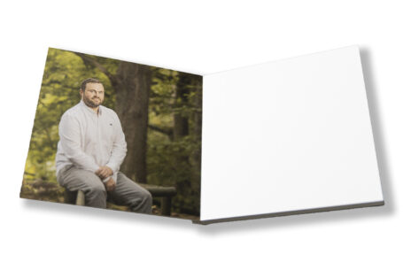 Bespoke wedding guest book with picture of the groom to be James