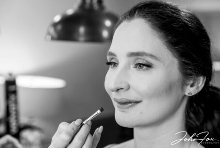 A close up of the bride, Joanne having her make-up done at The Ashes Barns in Staffordshire