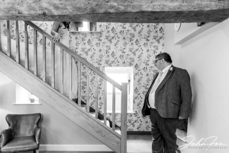 Bride and Dad - dad seeing daughter in her dress for the first time.