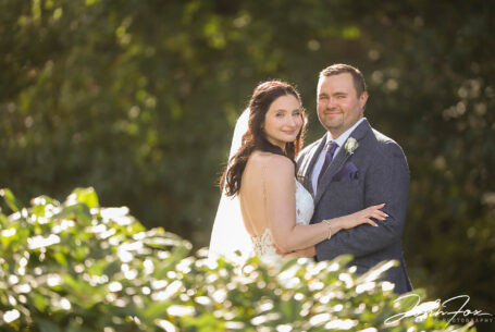 Bride and groom portrait in the sunlight at The Ashes Barns in Staffordshire