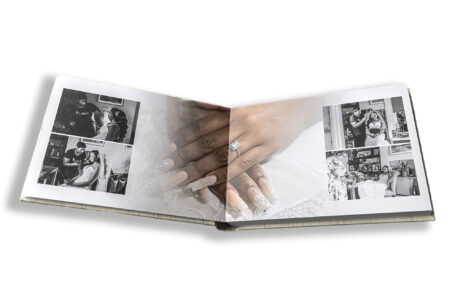 Wedding album showing bridal preparations and detailed image of the bride's wedding ring.