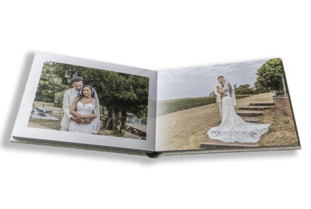 Wedding album showing images of the bride and groom in the grounds at Fentham Hall.
