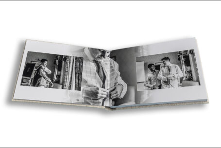 The wedding album opened at the pages showing the groom's preparations for his Kilworth House wedding.