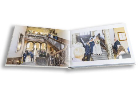 Grace, the bride, on her way to the wedding ceremony at Chicheley Hall, Buckinghamshire. Images presented in a stylish wedding album by John Fox.