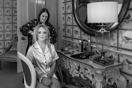 Bridal preparations: Tanya having her hair styled in preparation for her Cambridgeshire wedding at Holmewood Hall
