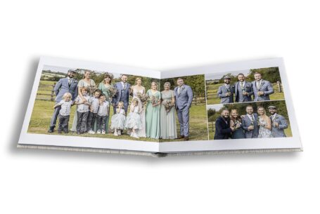 Images of Charlotte and Stefan’s Wedding Guests with the newly-weds at the Tractor Barn in Northamptonshire