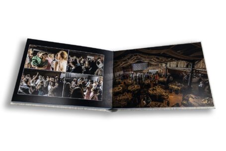 Charlotte and Stefan’s bespoke wedding album opened at a page of evening celebrations on their wedding day at the Tractor Barn in Northamptonshire