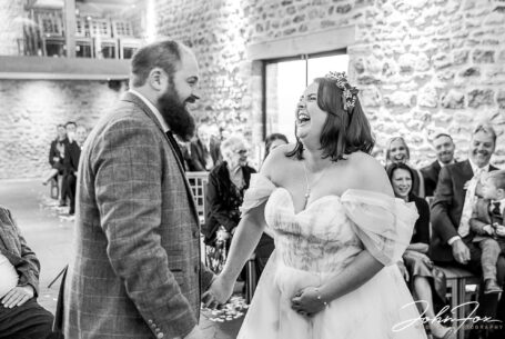 Happy moments captured at Abigail and Daniel’s wedding ceremony at Dodford Manor, Northamptonshire
