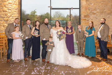 With Storm Claudia outside, the family group photos were taken inside at Dodford Manor, Northamptonshire.