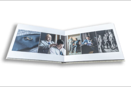 Wedding album opened at the page showcasing the groom's wedding preparations at the historic Guildhall Leicester. Wedding Packages in Leicester with John Fox Wedding Photography