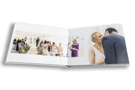 Wedding ceremony images taken by John Fox and displayed in the beautiful wedding album for Sophia and Dimitri. Wedding Photographer based in Warwickshire