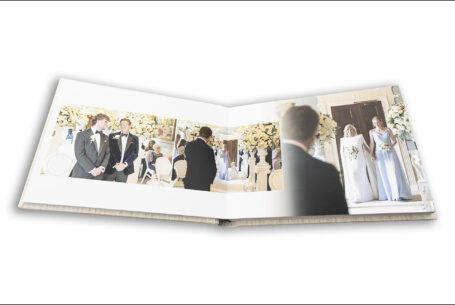 Wedding album page design showing entrance of the bride, Celia, at Grantley Hall, North Yorkshire