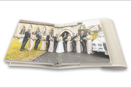 Wedding album showing formal group image at the church - The Tramontina wedding album by John Fox Wedding Photography