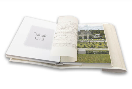 Creative wedding album design - translucent page with a line drawing of the venue placed on top the printed image of Tortworth Court in Gloucestershire