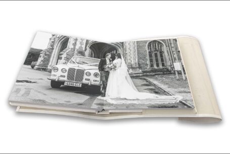Clare and James next to their Rolls Royce wedding car - The Tramontina wedding album by John Fox Wedding Photography