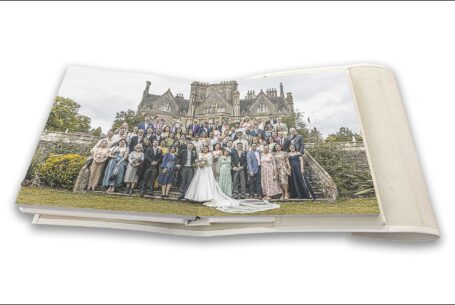 Wedding album showing images of the wedding guests and Tortworth Court for Clare and James wedding