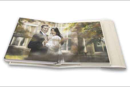 Wedding album showing images of the bride and groom in the grounds at Tortworth Court by John Fox Wedding Photography