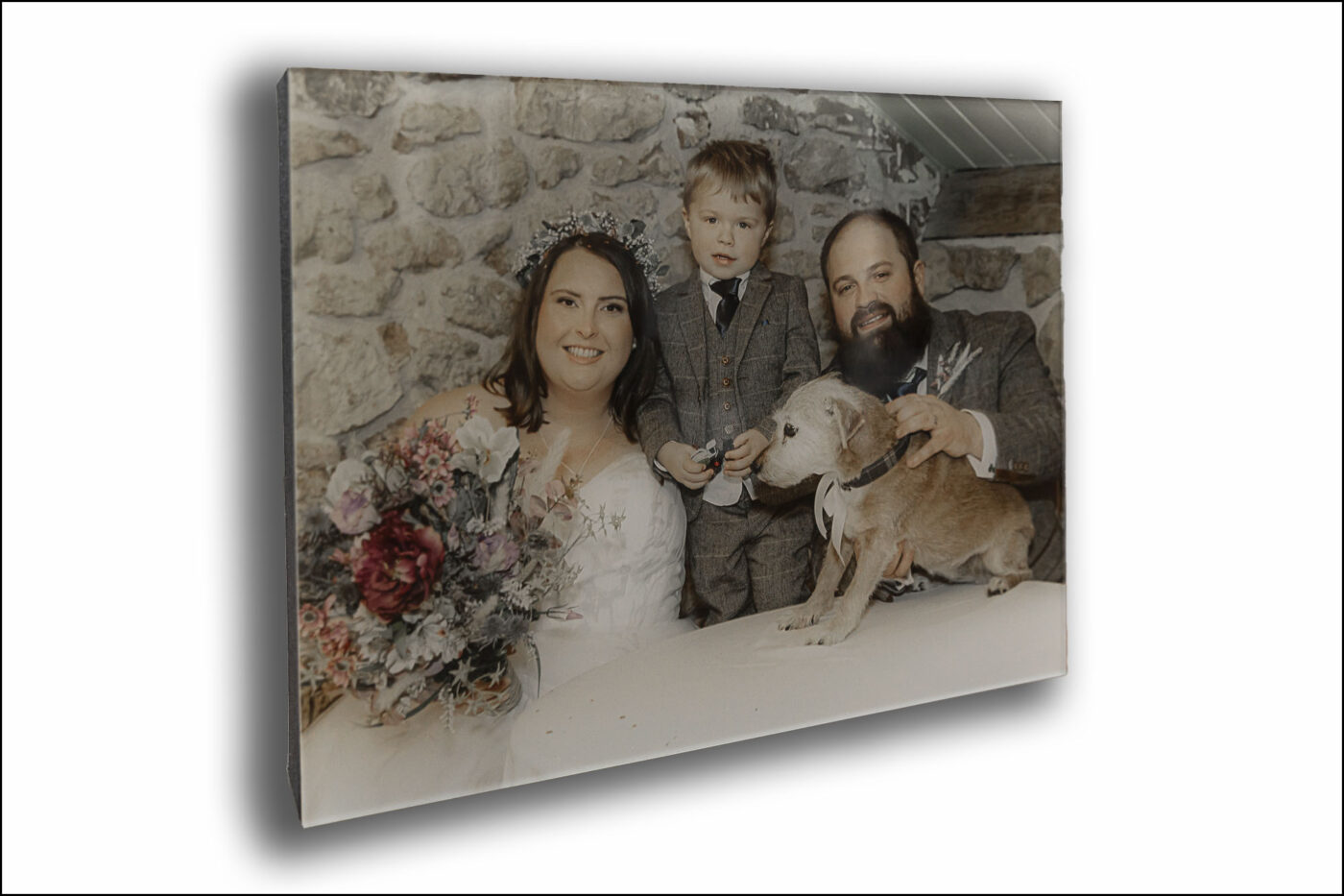 Abigail and Daniel’s Dodford Manor Wedding Album cover. John Fox's image of the newlyweds with their son and pet dog.