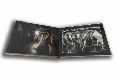 Abigail and Daniel’s Dodford Manor Wedding Album opened at pages showing their first dance