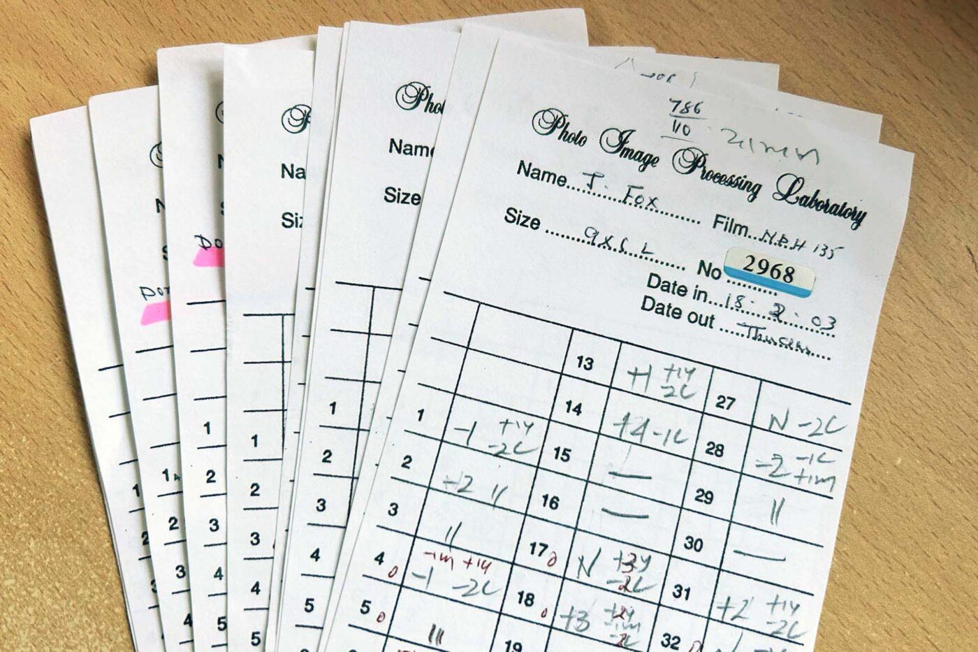 Professional Wedding Photographer John Fox found Photo Image Processing Laboratory slips that advised on the light and tone required for an image before digital took over